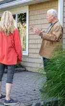 Owner Steve Rich speaking to a customer